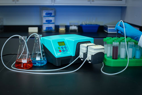 Paristaltic Pump and A Balance on a Table