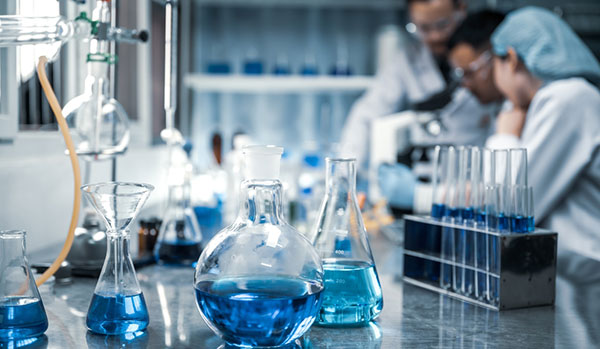 Beakers and Flasks on a Lab Table