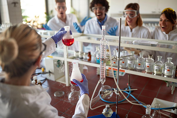 Looking and a flask in a lab
