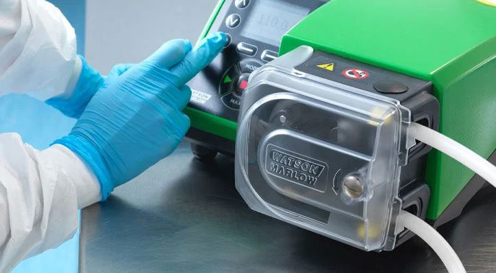 Pump being fitted with flexible tubing
